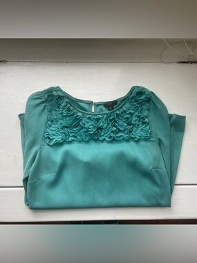 Ann Taylor turquoise blouse with flower ruffles